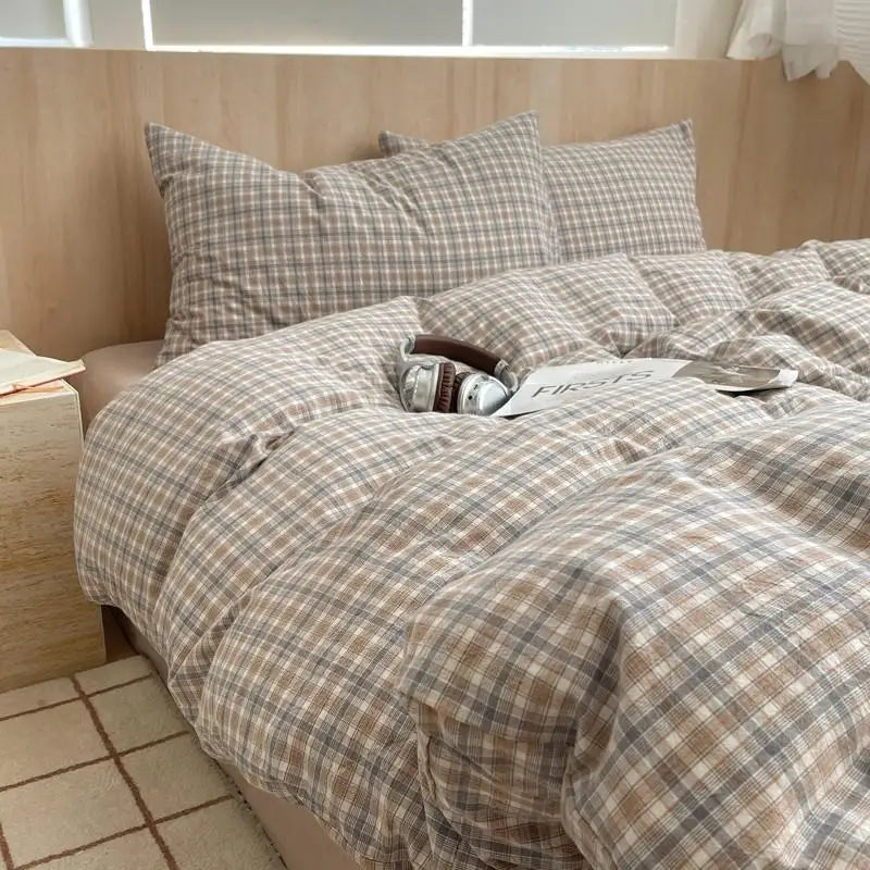 mocha and grey plaid cotton bedding set on bed
