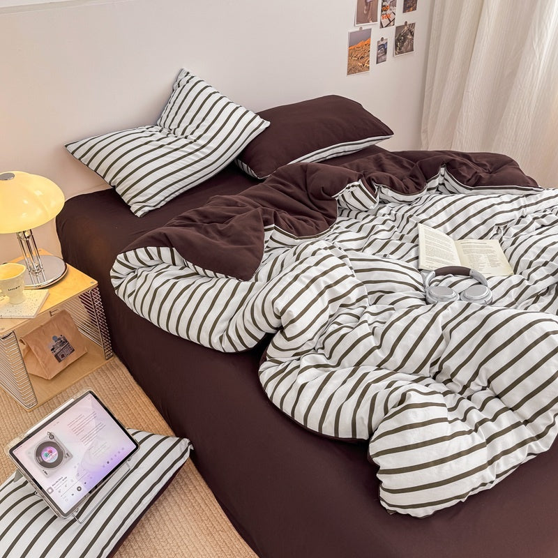 Olive green striped bedding set on white with deep brown solid sheet and reverse