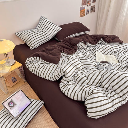 Olive green striped bedding set on white with deep brown solid sheet and reverse