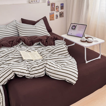 Olive green striped bedding set on white with deep brown solid sheet and reverse