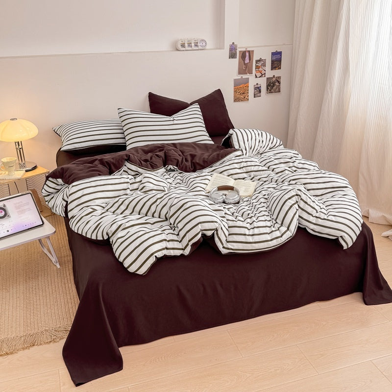 Olive green striped bedding set on white with deep brown solid sheet and reverse
