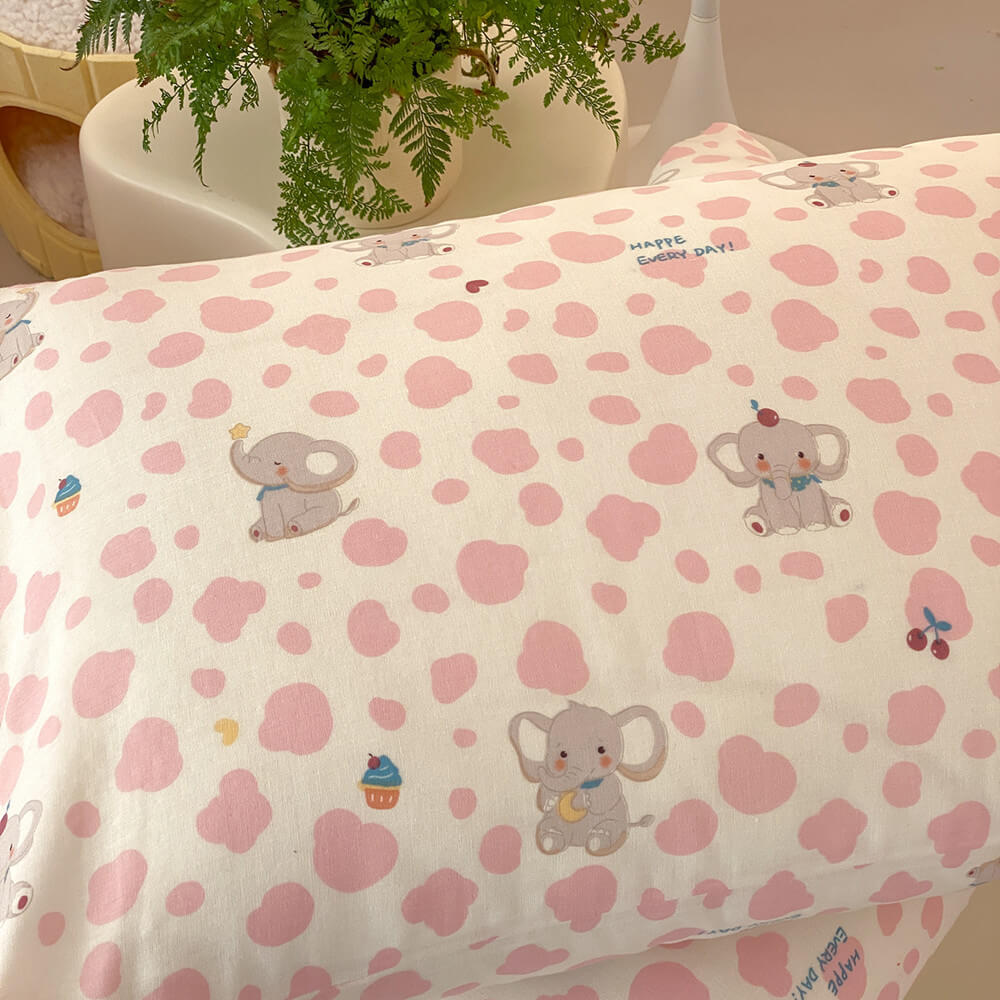 Pippa Elephant Spot Cotton Bedding Set - close-up of elephants, cupcakes and cherries on a pillowcase - WhisperLinens