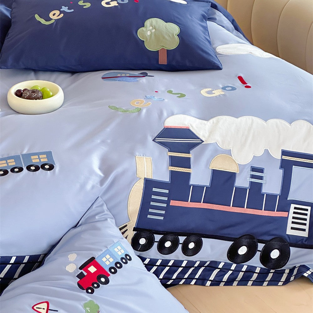 Junction Train Appliqué Cotton Bedding Set - close-up of steam train appliqué and railway-track border - WhisperLinens