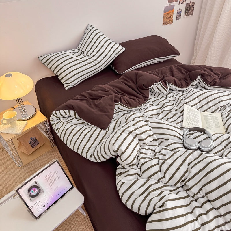 Olive green striped bedding set on white with deep brown solid sheet and reverse
