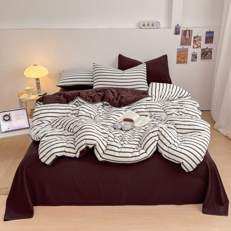 Olive green striped bedding set on white with deep brown solid sheet and reverse