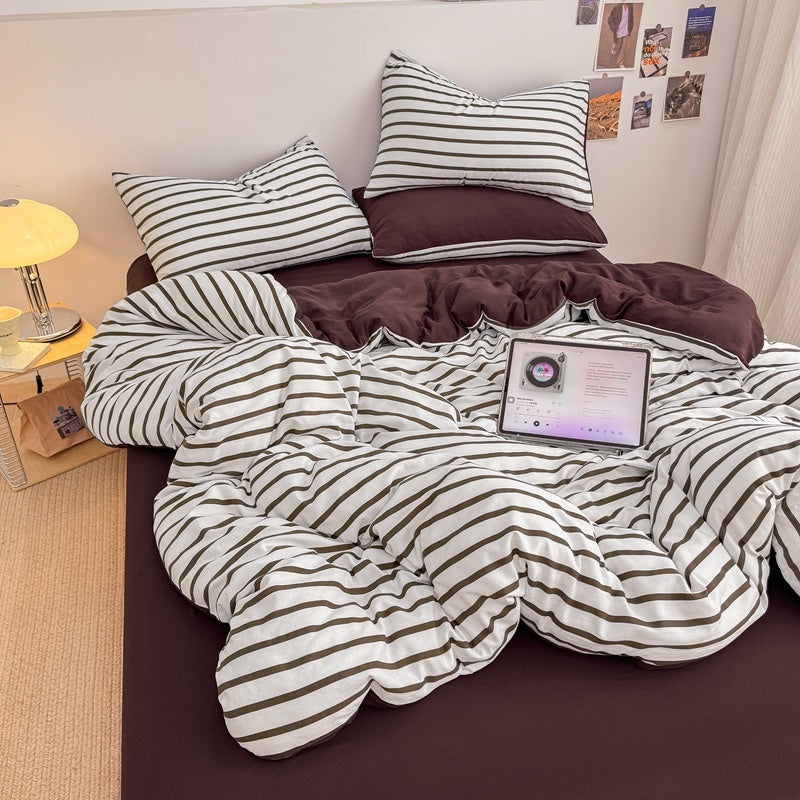 Olive green striped bedding set on white with deep brown solid sheet and reverse