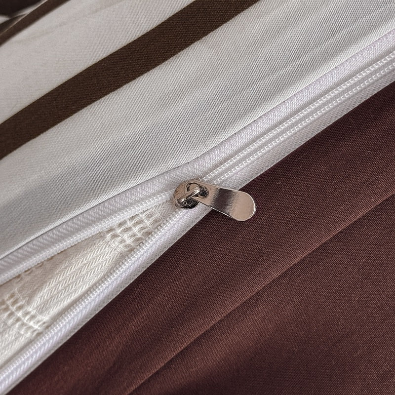 Olive green striped bedding set on white with deep brown solid sheet and reverse