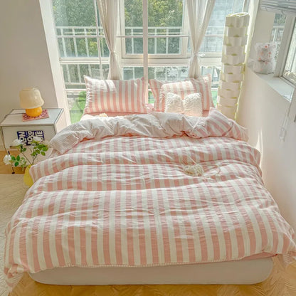 cream bedding set with blush pink and burgundy stripes