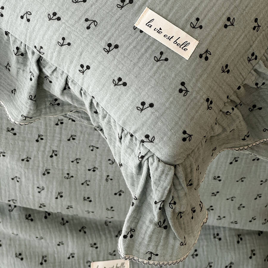 Cerise Cherry Print Ruffled Cotton Gauze Bedding Set - close-up of cherry print, ruffle and picot edge - WhisperLinens