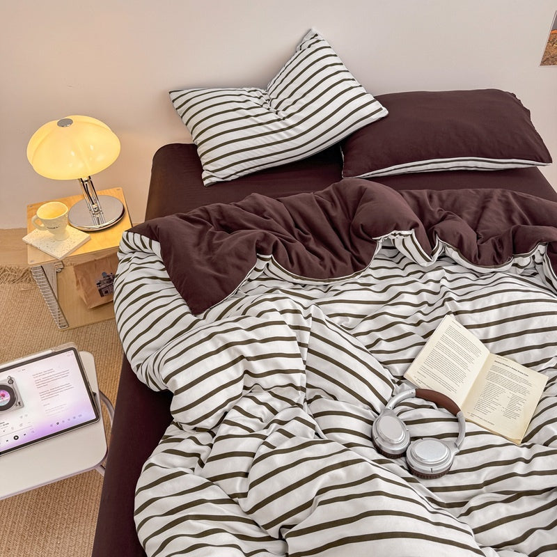 Olive green striped bedding set on white with deep brown solid sheet and reverse