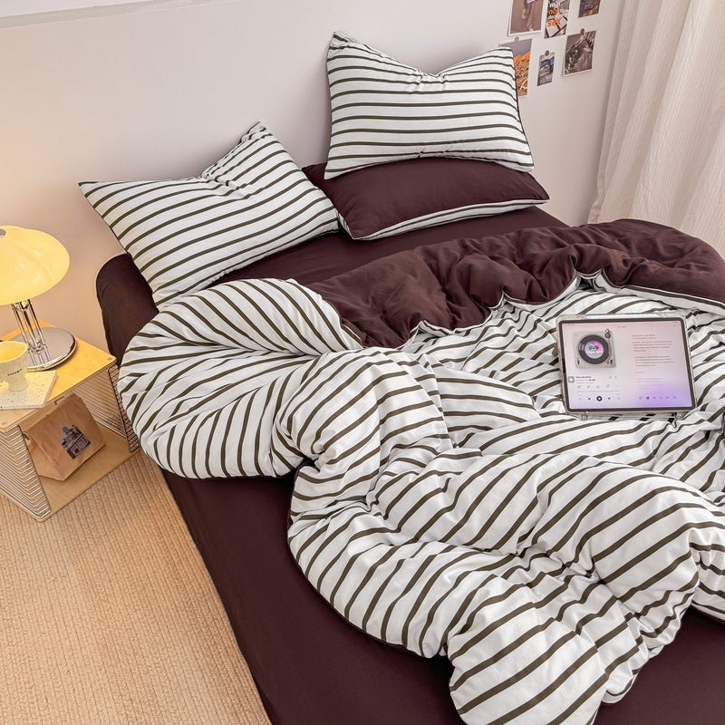 Olive green striped bedding set on white with deep brown solid sheet and reverse