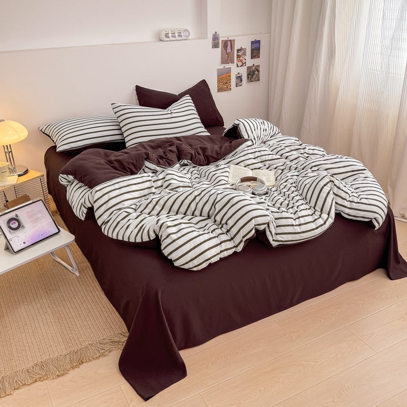 Olive green striped bedding set on white with deep brown solid sheet and reverse