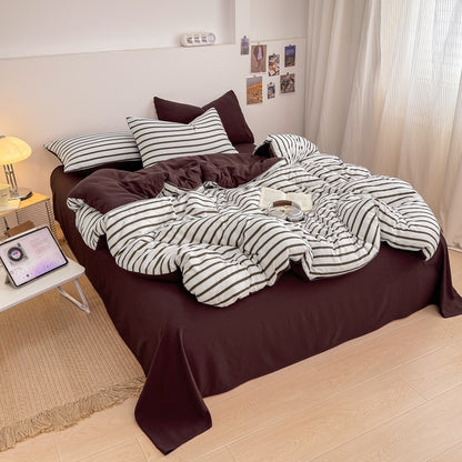 Olive green striped bedding set on white with deep brown solid sheet and reverse