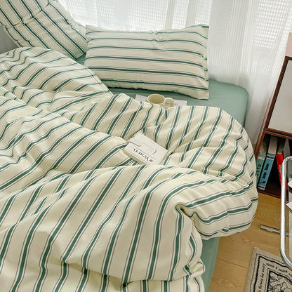 green striped bedding set with cream base and evenly spaced lines