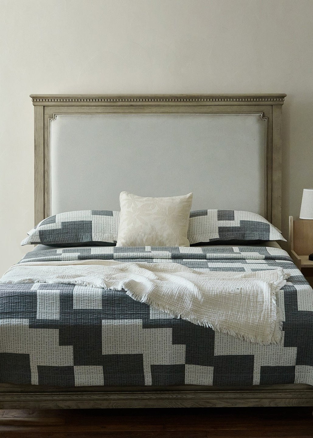Elowen Crinkle Jacquard Throw Blanket - ivory throw over a patchwork quilt - WhisperLinens