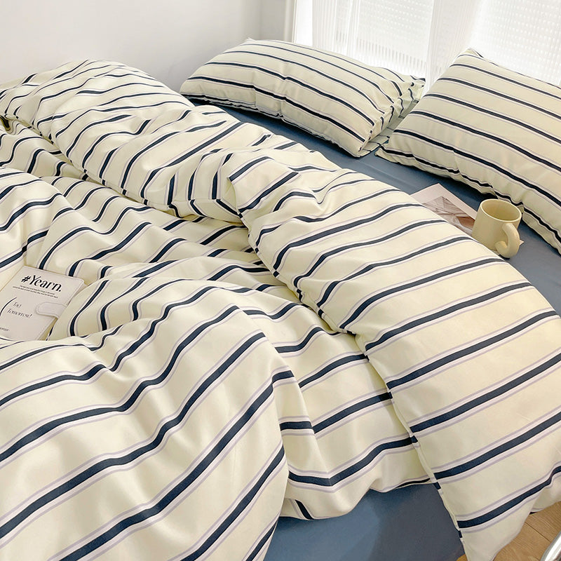 navy striped bedding set with white background and deep blue lines